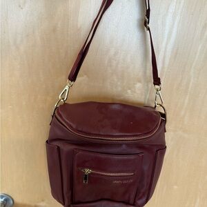Fawn Design Burgundy Mini Backpack with Leather Material and Adjustable Strap